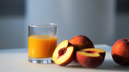peaches and glass of juice