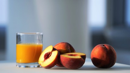 peaches and glass of juice