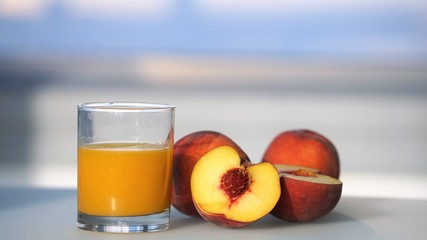 peaches and glass of juice