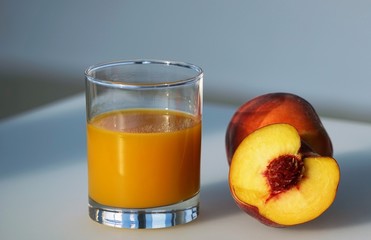 peaches and glass of juice