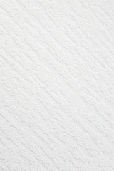 White textured background. Wall in the flat.
