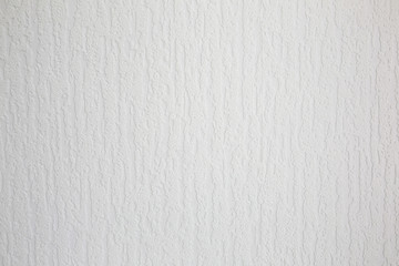 White textured background. Wall in the flat.