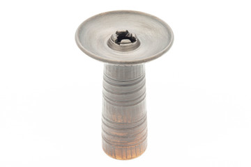 Clay brown bowl for a hooka on a white background.