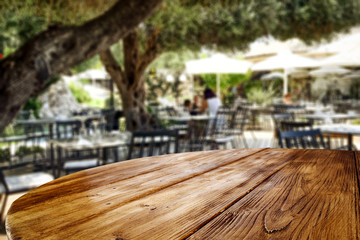 Desk of free space and blurred background of interior 