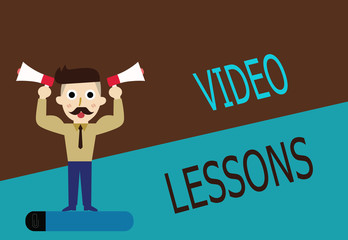 Conceptual hand writing showing Video Lessons. Business photo text Online Education material for a topic Viewing and learning.