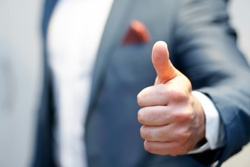 businessman with thumb up