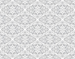 Wallpaper in the style of Baroque. Seamless vector background. White and grey floral ornament. Graphic pattern for fabric, wallpaper, packaging. Ornate Damask flower ornament.