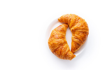 Top view flatlay with two fresh croissants. Morning meal concept. White background
