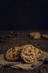 Cookies with chocolate chips on burlap fabric