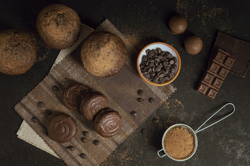 Top view muffins and sweet ingredients