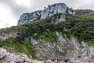 Italy, Capri, view of the coast seen from the sea.