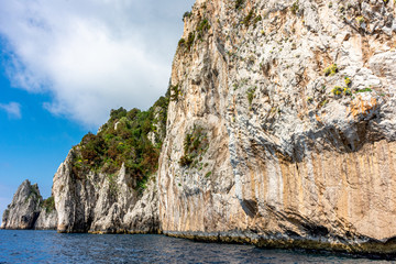 Italy, Capri, view of the coast seen from the sea.