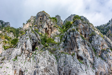 Italy, Capri, view of the coast seen from the sea.
