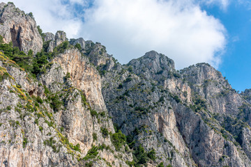 Italy, Capri, view of the coast seen from the sea.