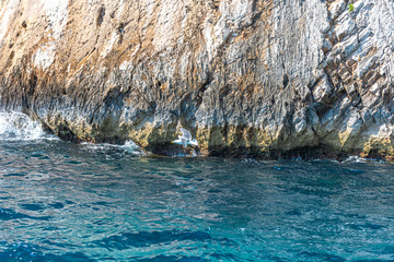 Italy, Capri, view of the coast seen from the sea.