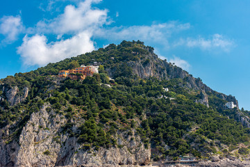 Italy, Capri, view of the coast seen from the sea.