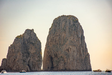 Italy, Capri, view of the faraglioni seen from the sea.