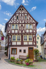 Flowers in front of a half timbered house in Limburg an der Lahn, Germany