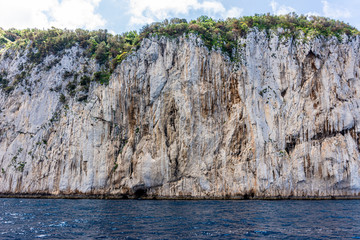 Italy, Capri, view of the coast seen from the sea.