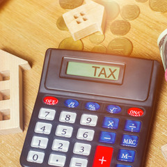 Inscription Tax on the calculator. The concept of paying taxes for the property. Liabilities or...