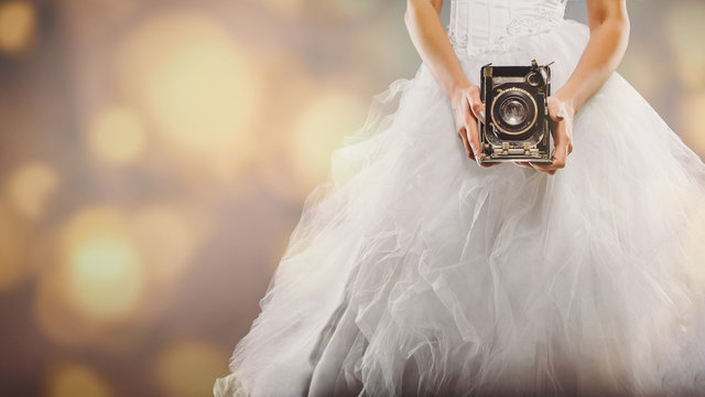 wedding photography - bride with retro camera