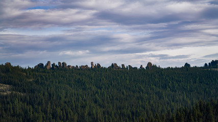 Stone city in the forest view from far away