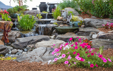 Landscape architecture with waterfall features for summer garden