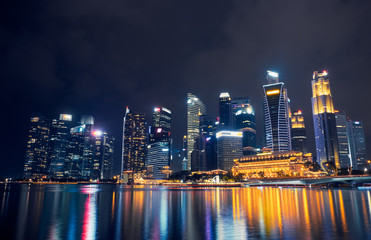 Fototapeta na wymiar Skyscrapers in Singapore at night