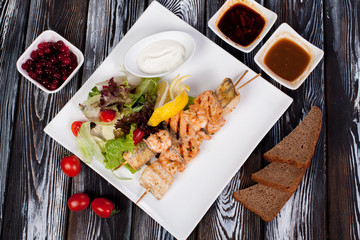 juicy and appetizing steak tamogavok of horse meat on the table, for design in cooking