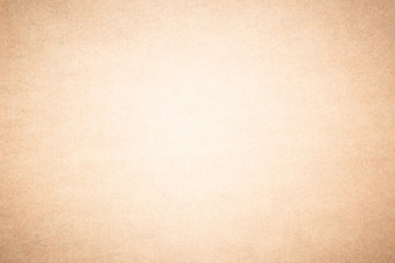 Beige recycled craft paper texture as background. Brown paper texture, Old vintage page or grunge vignette wrapping paper. Design brown retro for interior decoration hardboard.