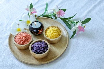 Spa Set concept. Handmade Salt Scrub And Cream Scrub With flower on disc wood. Thailand.