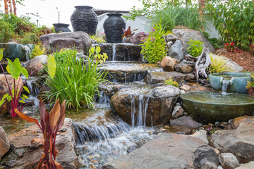 Landscape architecture with waterfall features for summer garden
