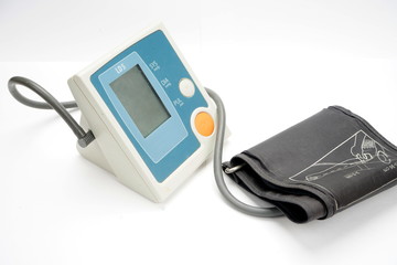 Digital blood pressure meter isolated on white background