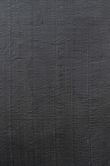 Fototapeta na wymiar texture of a dark fabric