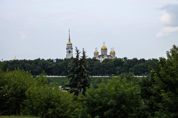 View of the Dormition Cathedral of green trees in Vladimir, Russia on a summer day