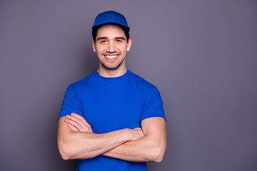Close up photo express specialist he him his delivery boy strong arms crossed beaming smile self-confident person order offer customer wear blue t-shirt cap corporate suit isolated grey background - obrazy, fototapety, plakaty