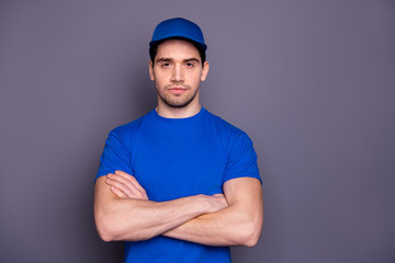 Close up photo express specialist he him his delivery boy strong arms crossed not smiling...