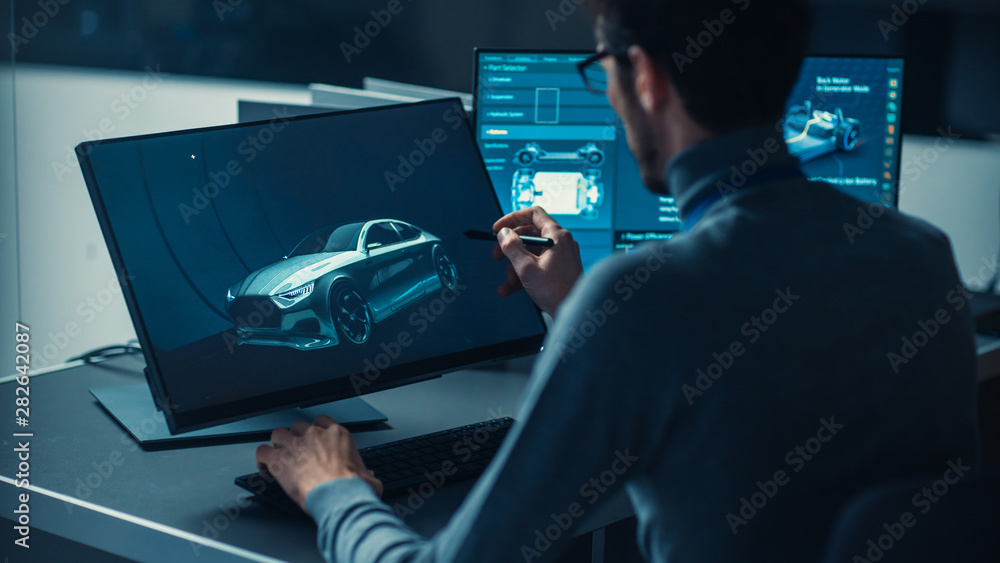 Leinwandbilder professional automotive graphic designer is working on concept car render with a stylus pen in a hig
