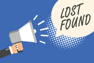 Conceptual hand writing showing Lost Found. Business photo text Things that are left behind and may retrieve to the owner Man holding megaphone loudspeaker speech bubble blue background