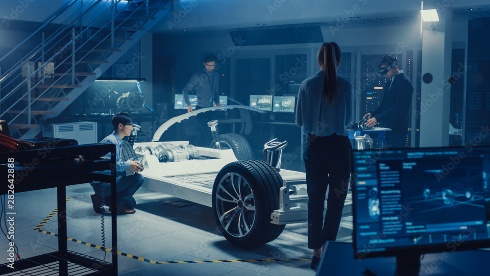 Poster automotive design engineers work and do tests on electric car chassis prototype. in innovation labor
