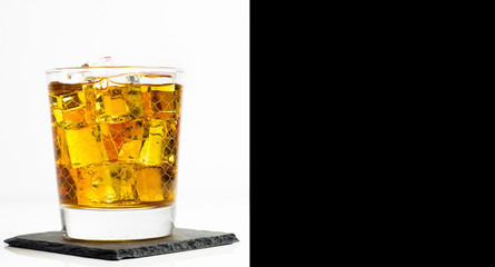Scottish whisky in a glass served with ice