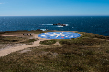 A compass rose located near The Tower of Hercules in La Coruna, Galicia, Spain. Travel concept.