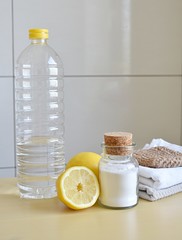 Lemon, baking soda and vinegar, natural ingredients for eco friendly and zero waste home cleaning.