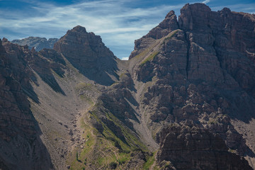 Fototapeta premium Panoramic view of towers and peaks of the Friuli Dolomites, in the morning light, in Friuli, Italy.