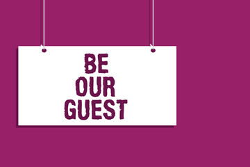 Handwriting text writing Be Our Guest. Concept meaning You are welcome to stay with us Invitation Hospitality Hanging board message communication open close sign purple background