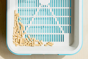 The image of woody litter tray for cats