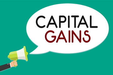 Handwriting text writing Capital Gains. Concept meaning Bonds Shares Stocks Profit Income Tax Investment Funds Man holding megaphone loudspeaker speech bubble message speaking loud