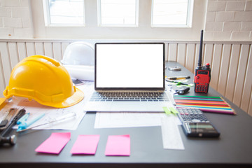 Concept Architect  and desk of Architectural project in construction site or office building with mining light