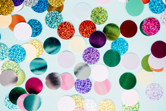 Colorful Confetti Explosion From Envelope On Blue Background.