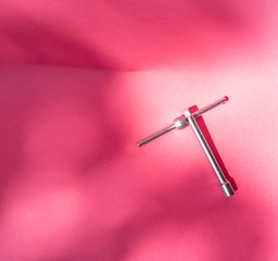 tool set  on the rose backround 